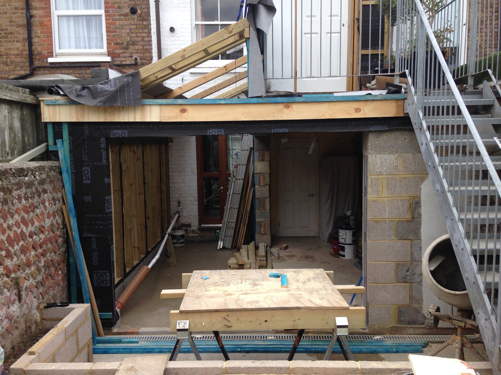 Single-storey rear extension under construction with new timber roof